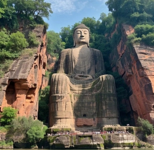 Leshan Giant Buddha front view with tourists below