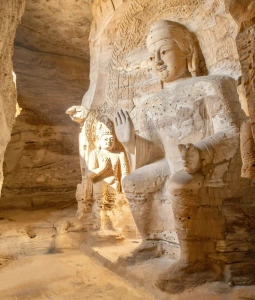 Yungang Grottoes interior Buddha statues in Datong China