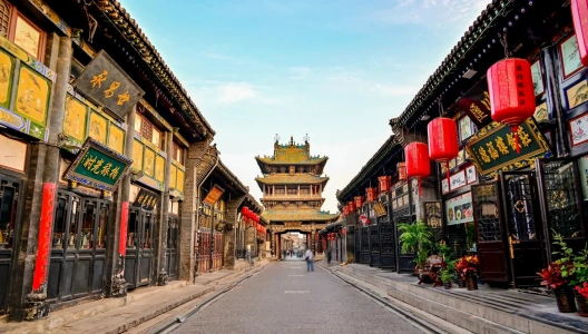Street view of the Ancient City of Pingyao with traditional shops and lanterns