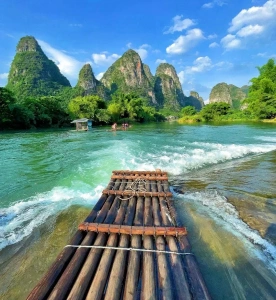 Bamboo rafting on Yulong River in Yangshuo with stunning karst mountains