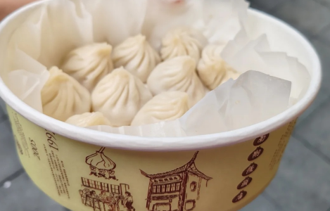 Famous local snacks near the City God Temple of Shanghai, including soup dumplings