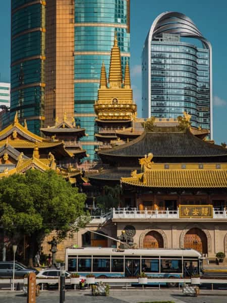Jing'an Temple with traditional architecture and city backdrop, Shanghai, China