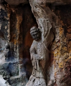 Ancient Buddha rock carving inside Luohan Temple