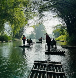 Morning bamboo rafting experience on the peaceful Yulong River