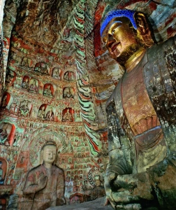 Giant Buddha statue and murals in Cave 5 of Yungang Grottoes