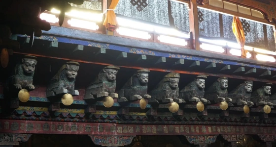 Wooden guardian beasts on Jokhang Temple’s second floor