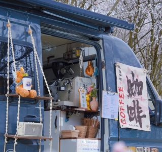 Coffee stall under cherry blossom trees at Pingba Farm