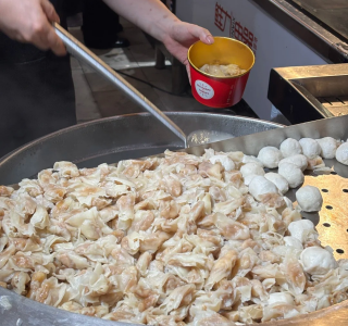 Local Fuzhou street food, dumplings and fish balls being cooked.