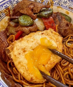 Signature Shanghai noodles with egg at Fuhe Noodle Sanlitun