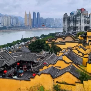 Rooftop view of Huguang Guild Hall with city and river backdrop